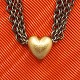 Ole Lynggaard, Heart clasp of 14k gold, with oxidized silver chain Ole Lynggaard, Heart clasp of 14k gold, with oxidized silver chain